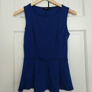 Blue peplum sleeveless top